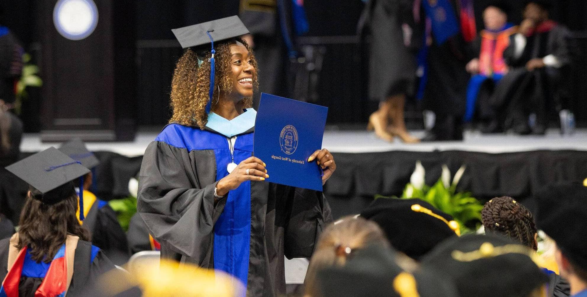 graduates at commencement